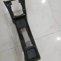 4.عدد رودری مشکی قاب دور فرمان کنسول وسط