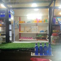 کانکس چوبی با قفسه داخل و تابلو‌سوپر قهوه