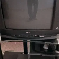 تلوزیون ب همراه میز