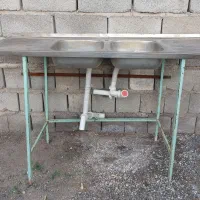 یک عدد فلاش تانک دوعدد پنکه سقفی ویک عدد سینک