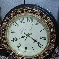 ساعت دیواری دو طرفه با پایه