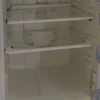 یخچال و فریزر ایندوزیت ایتالیا و میز تلوزیون شیشه