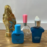 چهار عدد شیشه عطر خالی