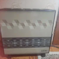 بخاری نیکلا و ساعت ایستاده|ساعت دیواری و تزئینی|بندر انزلی, ساحل قو|دیوار