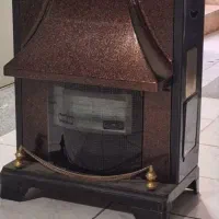 بخاری گازی مدل شومینه ای