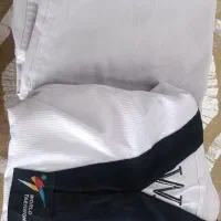 یک لباس تکواندو سایز سه خیلی کم استفاده شده