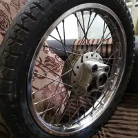 چرخ عقب و کاربراتور وچراغ خطر عقب وکوییل