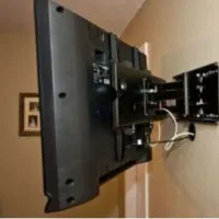 نصب تلویزیون روی دیوار،تنظیم آنتن،طراحی تی وی وال