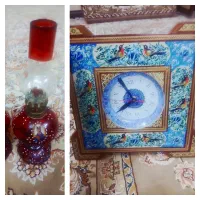 ساعت دیواری وچراغ نفتی