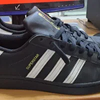 کتونی اورجینال ادیداس سوپر استار درحد اکبندسایز ۴۲