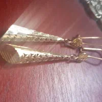 مقداری طلا ۱۰۰ بالای تابلو