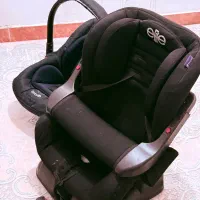 صندلی ماشین کودک و نی نی لای لای و یک روروئک