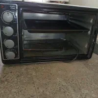 یک عدد ماکروفرمخصوص پیتزا درست کردن و ....|اجاق گاز و لوازم برقی پخت‌وپز|ایلام, |دیوار