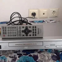 دستگاه DVD-s27 پاناسونیک و۱۰ عدد فیلم ویدیو