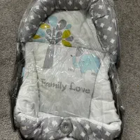 قنداق سویسی و لباس کودک