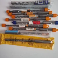 تعدادی مته ۴ شیار .صفحه گرانیت و استیل بر رولبولت