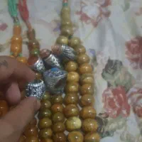 انگشتر نقره و تسبیح کهربا اصل