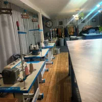 انجام خدمات اتو دکمه بسته بندی برش و دوخت