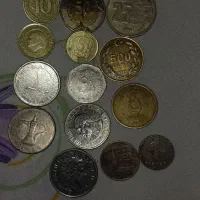 تعداد 14 عدد سکه خارجی