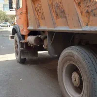 کامیون کمپرسی و غلطک شال مشکی