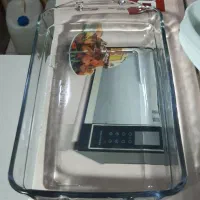 مرغ خوری و تعدادی لوازم آشپزخانه در حد نو