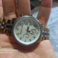 ساعت اصل میشل کورس