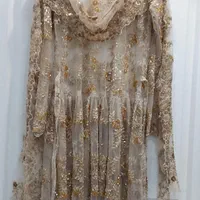 لباس سقزی کرم رنگ