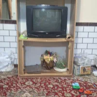 تلویزیون و میز زیر تلویزیون