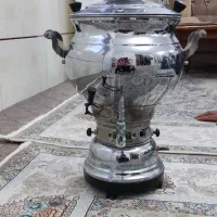 بخاری ،کمد بچه ،ساعت برنز ،میز تحریر تاشو ، میز