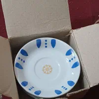 بشقاب چای و چاقو میوه