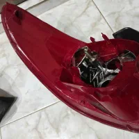 چراغ عقب ۲۰۶ اس دی چراغ مه شکن عقب جلو پنجره ۲۰۶|قطعات یدکی و لوازم جانبی|رشت, معلولین|دیوار