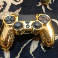 قاب استیل طلایی برای ps4 دسته