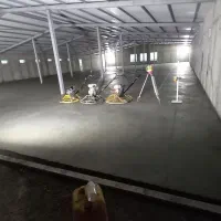 بتن ریزی کف با ماله پروانه