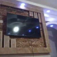 نصاب تلویزیون به دیوار