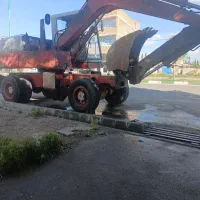خدمات با بیل مکانیکی