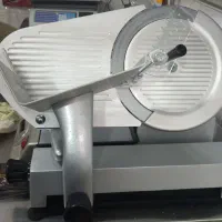 دستگاه کالباس بر وترازو
