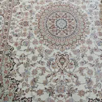 یک عدد روفرشی 12متری تقریبا نو ویک قالیچه