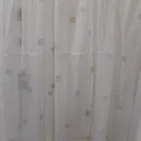 یک عدد پرده و یک پارچه حریر