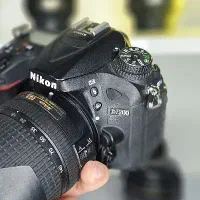 نیکون d7200  با لنز  18-140 نیکون و لنز 35 f 1.8