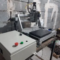 مانیتور و کیس به همراه دستگاه cnc