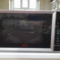 ماکروفر برقی لمسی و فن دار ژاپن