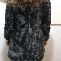 کاپشن|لباس|آفتاب, |دیوار