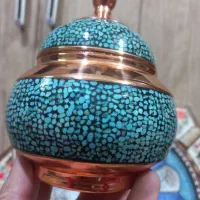 ساعت،خاتم ونقاشی مینا، و قندان مسی