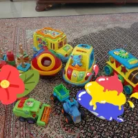 اسباب بازی حرکتی و موزیکال برند هالی توییز و تولو