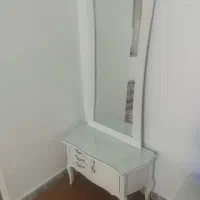 آینه وکنسول و ساعت ایستاده