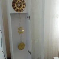 یک ساعت وپایه ویک جارخت وخواب