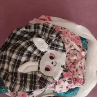 یک پلاستیک لباس نوزادی نو