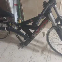 دوچرخه دوکمک