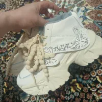 یه جفت کفش صفر نپوشیده شده