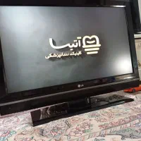 تلویزیون ال جی در حد نو اصل کره همراه با میز|تلویزیون و پروژکتور|اردبیل, |دیوار